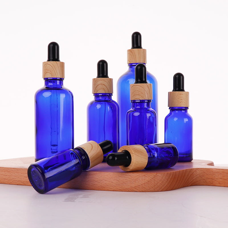 blue glass essential oil bottles