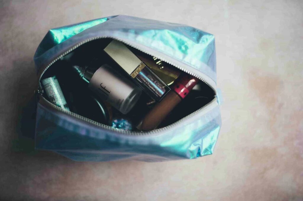 glass bottles in cosmetic bag