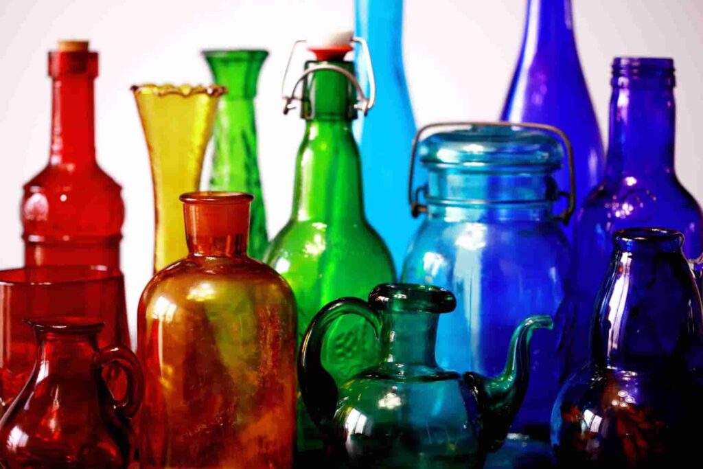 old empty glass bottles in different colors