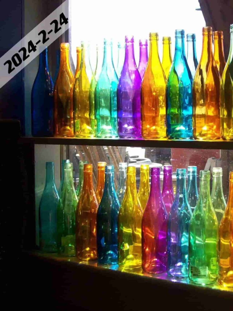 different colors of glass bottles