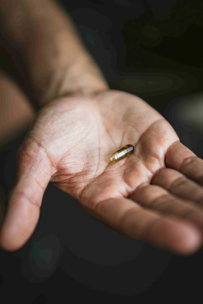 a capsule on a hand