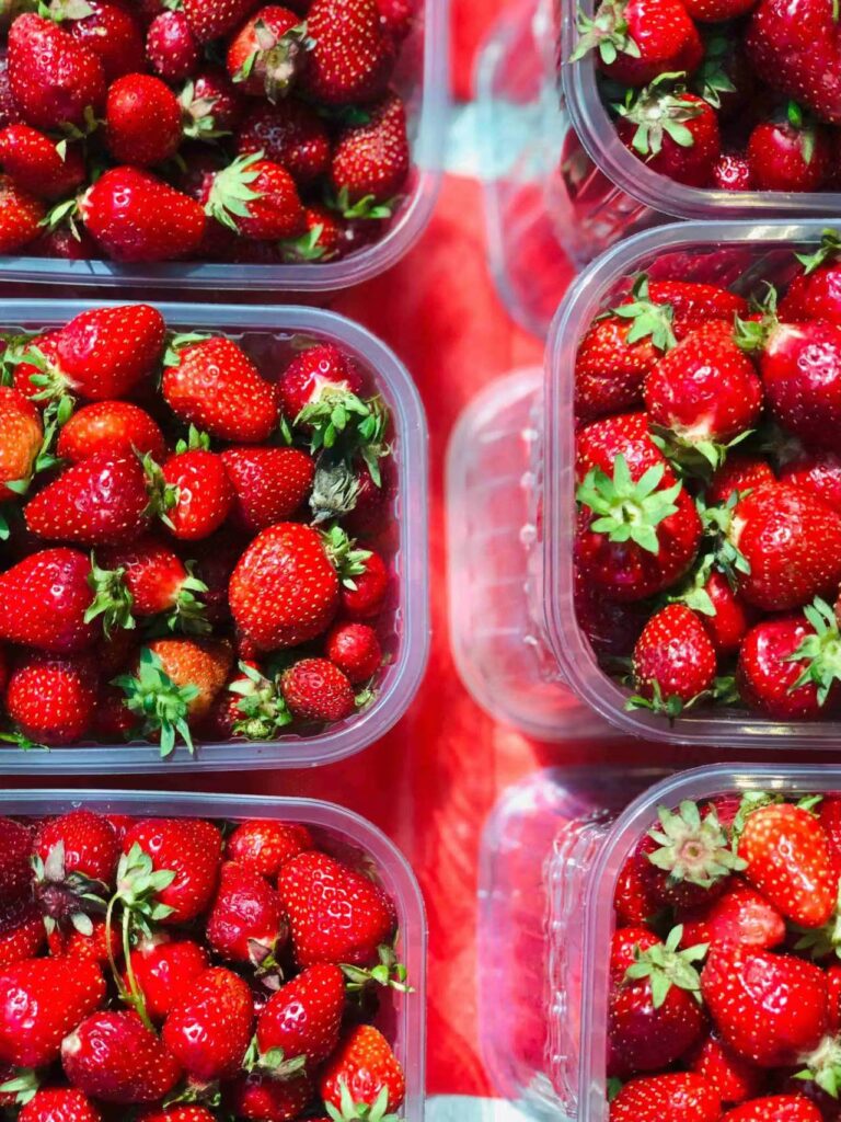 strawberries in plastic containers