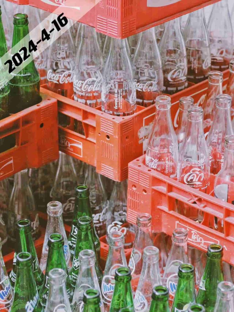 empty glass bottles in the baskets