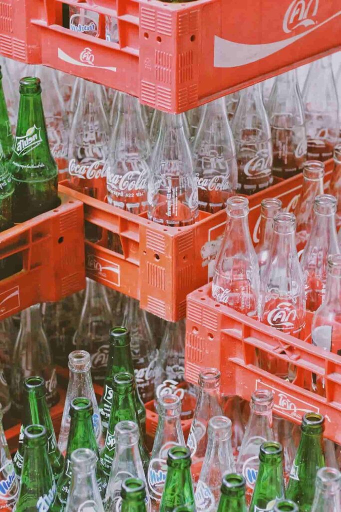 empty glass bottles in the baskets