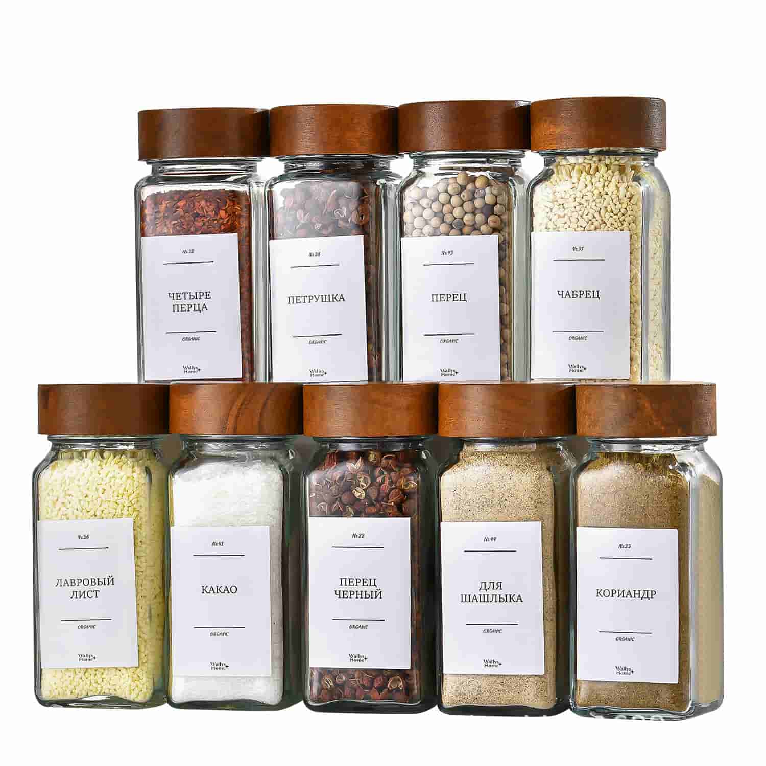 square glass spice jars with wooden lids and labels