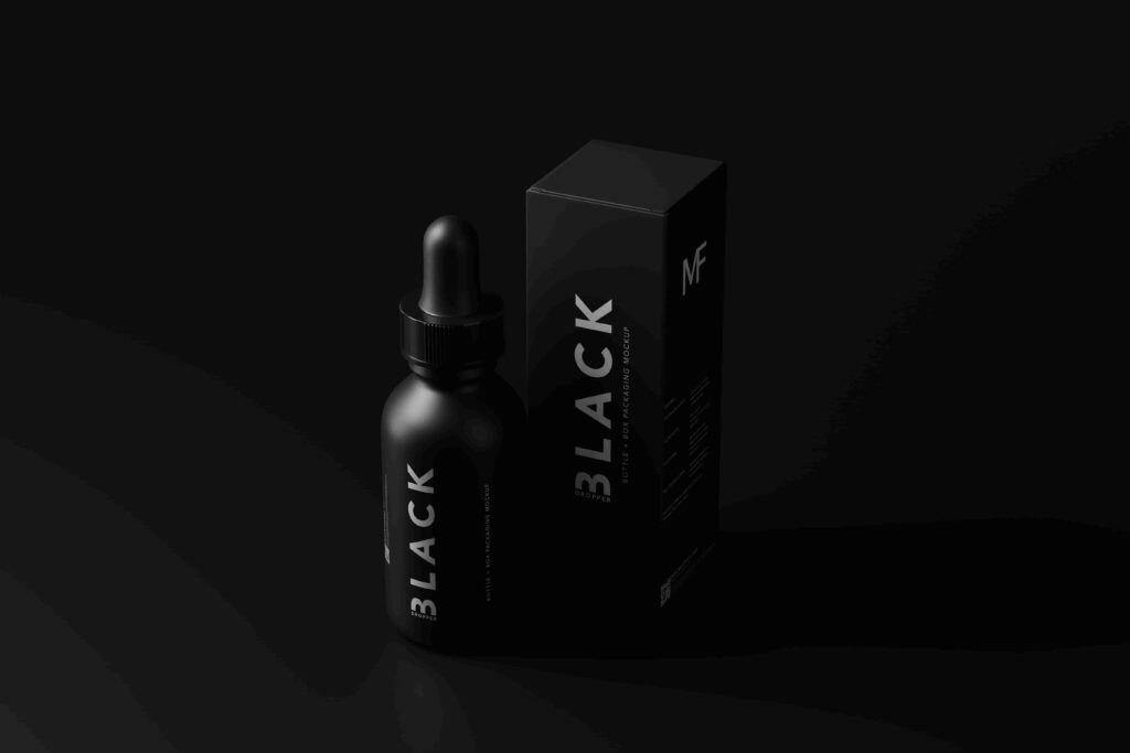 black essential oil bottle and black box