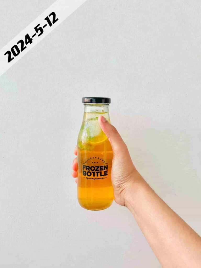 glass bottle with printing words
