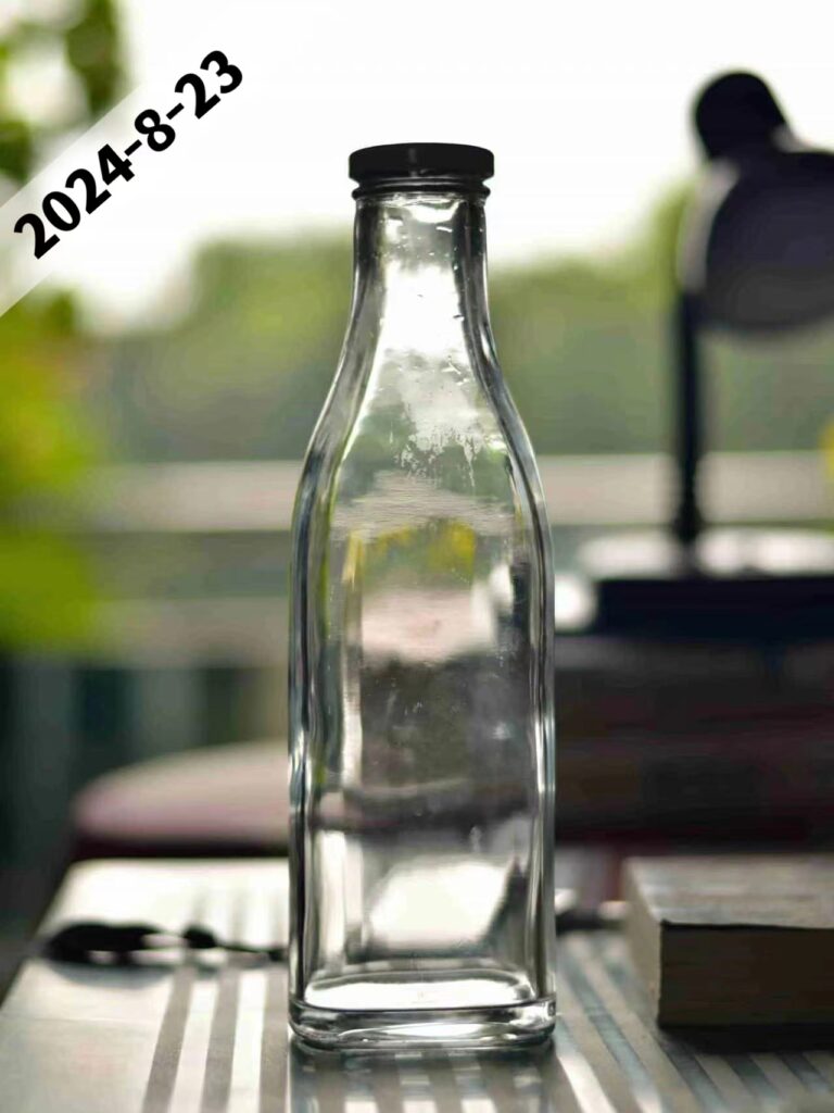 empty glass bottle with cap